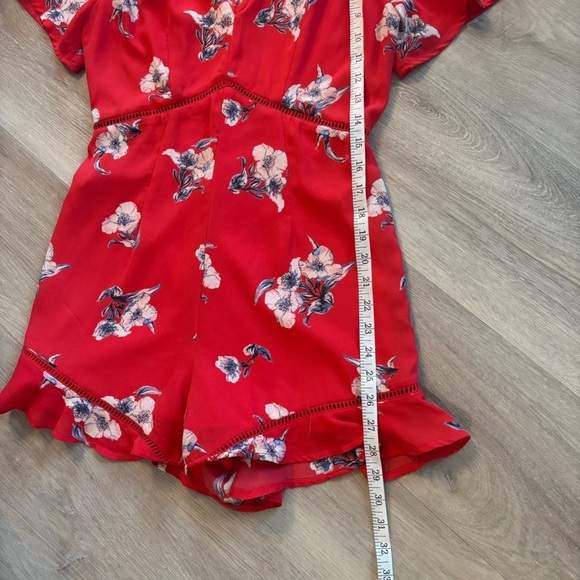 Sienna Sky Floral Romper | Short Flutter
Sleeve Romper - Picture 8 of 8